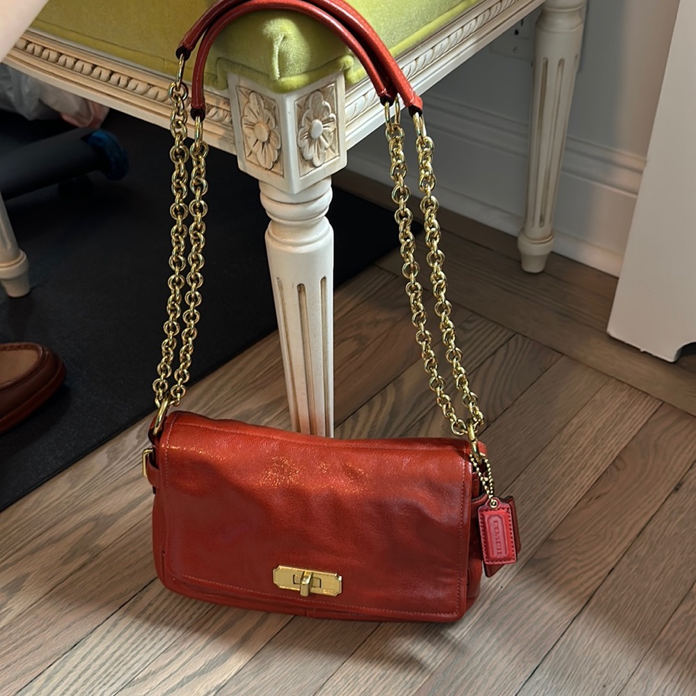 Coach handbag with gold chain strap in salmon. Like new